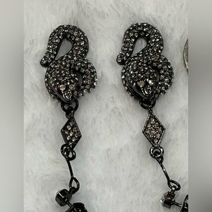 Dark silver tone dangle drop rhinestone snake earrings. V by Eva Collection